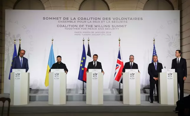 From the left, German Chancellor Friedrich Merz, Ukraine's President Volodymyr Zelenskyy, French President Emmanuel Macron, Britain's Prime Minister Keir Starmer, US Special Envoy Steve Witkoff and US businessman Jared Kushner attend a joint press conference after the signing of the declaration on deploying post-ceasefire force in Ukraine during the 'Coalition of the Willing' summit on security guarantees for Ukraine, at the Elysee Palace in Paris Tuesday, Jan 6, 2026. (Ludovic Marin, Pool photo via AP)