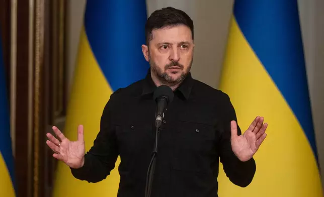 Ukraine's President Volodymyr Zelenskyy speaks during a briefing in Kyiv, Ukraine, Saturday, Jan. 3, 2026. (AP Photo/Danylo Antoniuk)