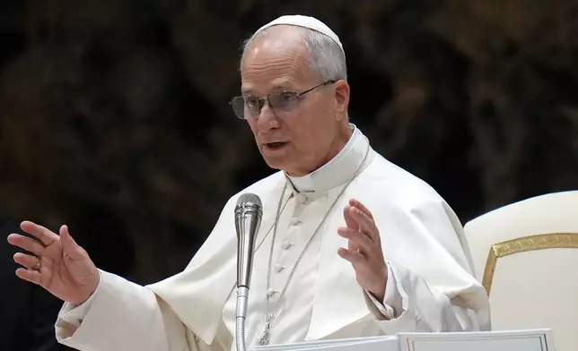 Pope Leo XIV holds his weekly general audience in the Paul VI Hall at the Vatican, Wednesday, Jan. 7, 2026. (AP Photo/Alessandra Tarantino)