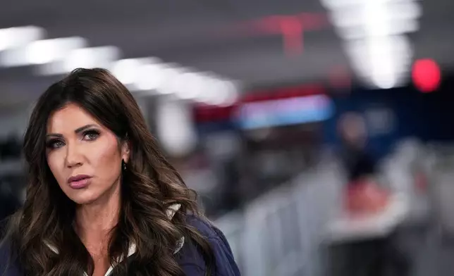 Homeland Security Secretary Kristi Noem speaks during a news conference at Federal Emergency Management Agency headquarters, Saturday, Jan. 24, 2026, in Washington. (AP Photo/Julia Demaree Nikhinson)