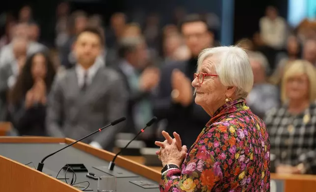 Holocaust survivior Tatiana Bucci, 88, from Italy, right, addresses the plenary during a session to mark the International Holocaust Memorial Day at the European Parliament in Brussels, Tuesday, Jan. 27, 2026. (AP Photo/Virginia Mayo)