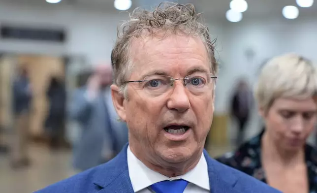 Sen. Rand Paul, R-Ky., speaks with reporters at the Senate Subway on Capitol Hill, Thursday, Jan. 8, 2026, in Washington. (AP Photo/Mariam Zuhaib)