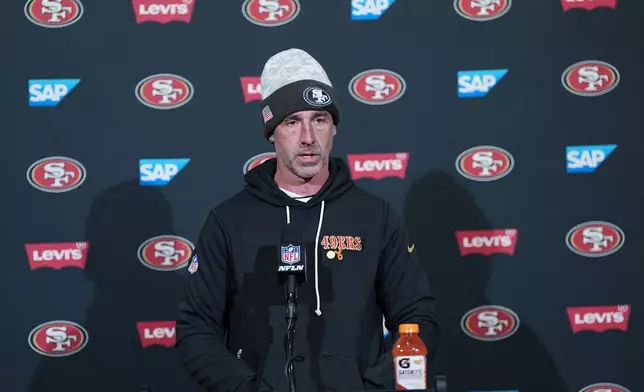 San Francisco 49ers head coach Kyle Shanahan talks during a news conference after an NFL wild-card playoff football game against the Philadelphia Eagles on Sunday, Jan. 11, 2026, in Philadelphia. (AP Photo/Matt Rourke)
