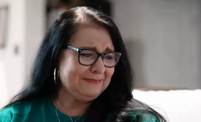 Velma Lisa Duran, sister of Robb Elementary teacher Irma Garcia, reflects on the 2022 Uvalde, Texas, school shooting during an interview on Dec. 19, 2025, in San Antonio. (AP Photo/Kin Man Hui)