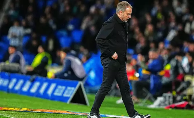 Barcelona's head coach Hansi Flick during the Spanish La Liga soccer match between Real Sociedad and Barcelona in San Sebastian, Spain, Sunday, Jan. 18, 2026. (AP Photo/Miguel Oses)