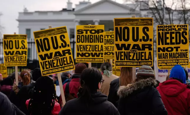 Protesters rally outside the White House Saturday, Jan. 3, 2026, in Washington, after the U.S. captured Venezuelan President Nicolás Maduro and his wife in a military operation. (AP Photo/Julia Demaree Nikhinson)