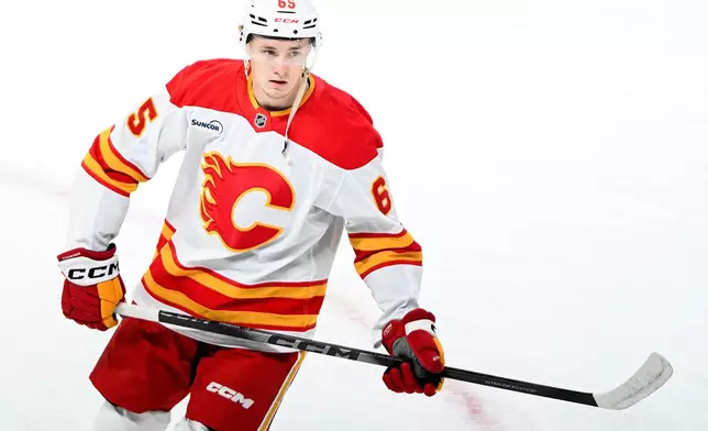 Calgary Flames' William Stromgren skates prior to making his NHL hockey debut against the Montreal Canadiens in Montreal, Wednesday, Jan. 7, 2026. (Graham Hughes/The Canadian Press via AP)