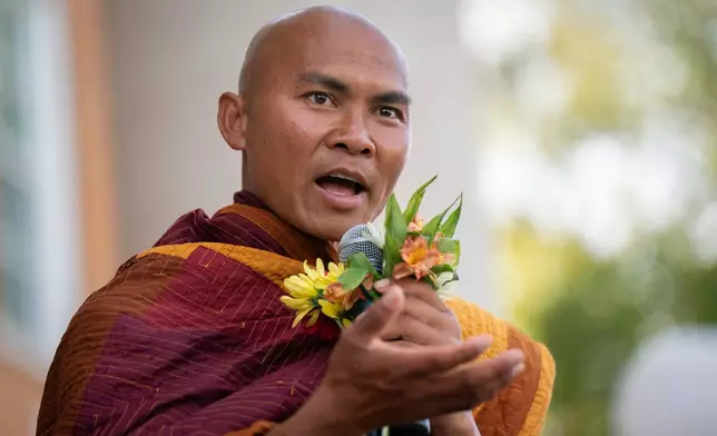 Bhikkhu Pannakara, a spiritual leader, speaks to supporters during the, "Walk For Peace," Thursday, Jan. 8, 2026, in Saluda, S.C. (AP Photo/Allison Joyce)