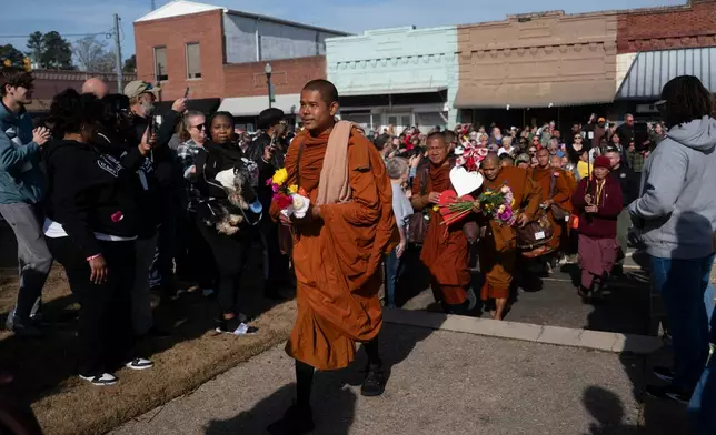 Buddhist monks who are participating in the, "Walk For Peace," arrive in Saluda, Thursday, Jan. 8, 2026, in Saluda, S.C. (AP Photo/Allison Joyce)