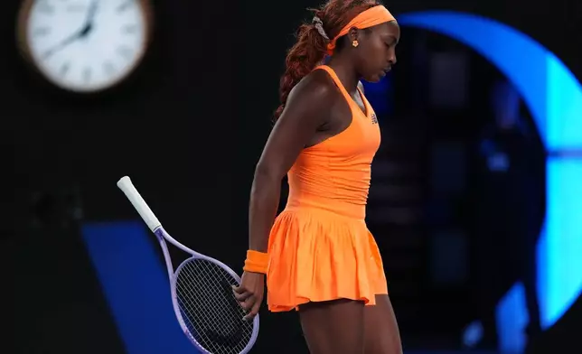 Coco Gauff of the U.S. reacts during her quarterfinal match against Elina Svitolina of Ukraine during their quarterfinal match at the Australian Open tennis championship in Melbourne, Australia, Tuesday, Jan. 27, 2026. (AP Photo/Dita Alangkara)