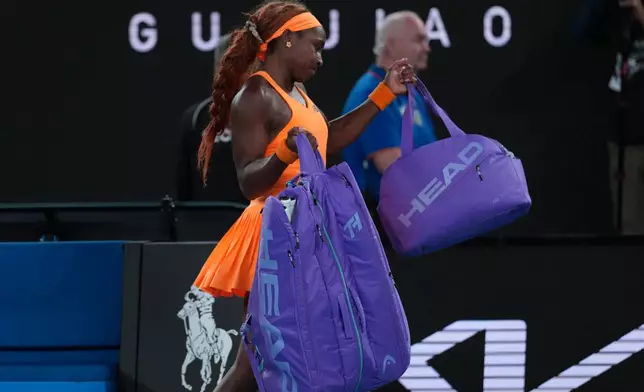 Coco Gauff of the U.S. walks from the court following her quarterfinal loss to Elina Svitolina of Ukraine at the Australian Open tennis championship in Melbourne, Australia, Tuesday, Jan. 27, 2026. (AP Photo/Dita Alangkara)