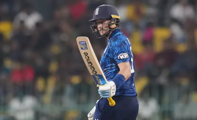 England's Joe Root celebrates his fifty runs during the second ODI cricket match between England and Sri Lanka in Colombo, Sri Lanka, Saturday, Jan. 24, 2026. (AP Photo/Eranga Jayawardena)