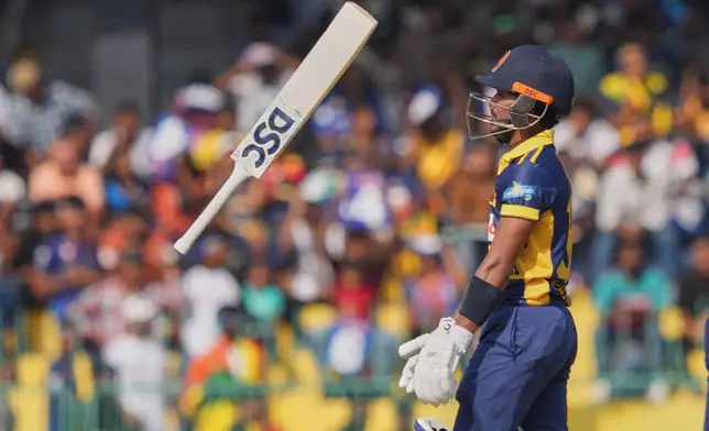 Sri Lanka's Pathum Nissanka leaves the ground after losing his wicket during the second ODI cricket match between England and Sri Lanka in Colombo, Sri Lanka, Saturday, Jan, 24, 2026. (AP Photo/Eranga Jayawardena)