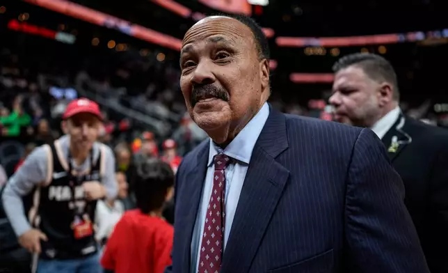 Martin Luther King III leaves the court during the second half of an NBA basketball game between the Atlanta Hawks and the Milwaukee Bucks, Monday, Jan. 19, 2026, in Atlanta. (AP Photo/Mike Stewart)