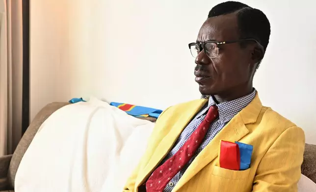 Nkuka Mboladinga, also known as Lumumba Vea, speaks to Associated Press in Casablanca, Morocco, Saturday, Jan. 3, 2026. (AP Photo/Samy Ntumba Shambuyi)