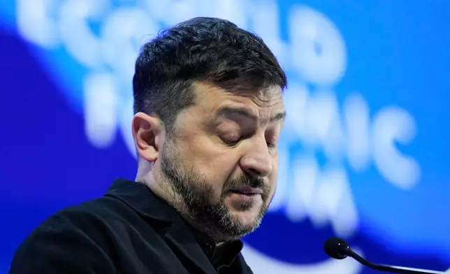 Ukraine's President Volodymyr Zelenskyy delivers a speech at the Annual Meeting of the World Economic Forum in Davos, Switzerland, Thursday, Jan. 22, 2026. (AP Photo/Markus Schreiber)