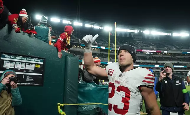San Francisco 49ers running back Christian McCaffrey leaves the field after an NFL wild-card playoff football game against the Philadelphia Eagles on Sunday, Jan. 11, 2026, in Philadelphia. (AP Photo/Matt Rourke)