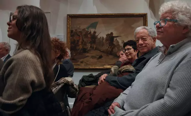 People listen to an orator during an event commemorating the 250th anniversary of the publication of Thomas Paine's Common Sense at the Fraunces Tavern Museum on Saturday, Jan. 10, 2026, in New York. (AP Photo/Andres Kudacki)