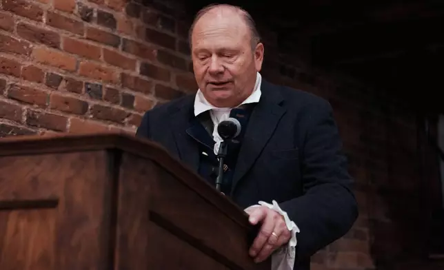 A man orates selected readings from Thomas Paine's Common Sense during an event commemorating the 250th anniversary of the pamphlet's publication at the Fraunces Tavern Museum on Saturday, Jan. 10, 2026, in New York. (AP Photo/Andres Kudacki)