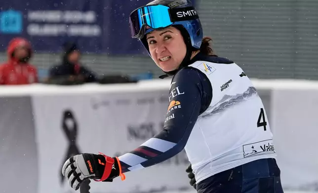 United States' Jacqueline Wiles at the finish line during an alpine ski, women's World Cup downhill, in Crans Montana , Switzerland, Friday, Jan. 30, 2026. (AP Photo/Giovanni Auletta)