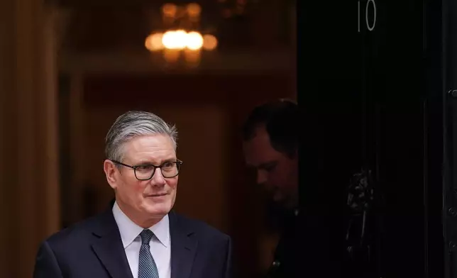 Britain's Prime Minister Keir Starmer leaves 10 Downing Street to welcome President Prabowo Subianto of Indonesia and after Britain's government has approved a massive new Chinese Embassy in central London in London, Tuesday, Jan. 20, 2026.(AP Photo/Alberto Pezzali)