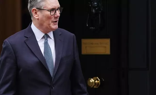 Britain's Prime Minister Keir Starmer leaves 10 Downing Street to welcome President Prabowo Subianto of Indonesia and after Britain's government has approved a massive new Chinese Embassy in central London in London, Tuesday, Jan. 20, 2026.(AP Photo/Alberto Pezzali)