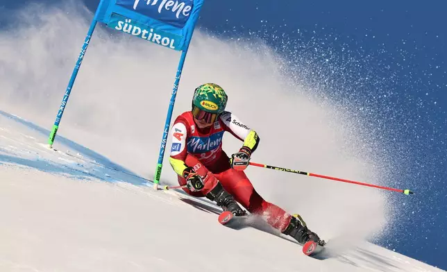 Austria's Julia Scheib speeds down the course during a women's World Cup giant slalom, in Kronplatz, Italy, Tuesday, Jan. 20, 2026. (AP Photo/Marco Trovati)