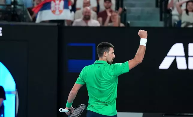 Novak Djokovic of Serbia reacts during his third round match against Botic van de Zandschulp of the Netherlands at the Australian Open tennis championship in Melbourne, Australia, Saturday, Jan. 24, 2026. (AP Photo/Dita Alangkara)
