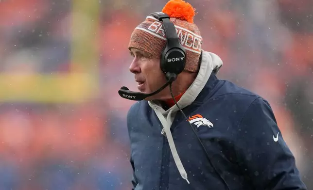 Denver Broncos head coach Sean Payton watches during the second the half of the AFC Championship NFL football game against the New England Patriots, Sunday, Jan. 25, 2026, in Denver. (AP Photo/John Locher)