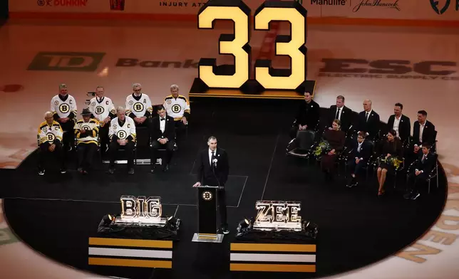 Former Boston Bruins captain Zdeno Chara speaks during his number retirement ceremony before an NHL hockey game between the Boston Bruins and the Seattle Kraken Thursday, Jan. 15, 2026, in Boston. (AP Photo/Winslow Townson)