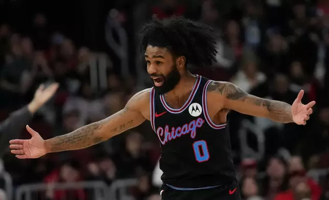 Chicago Bulls guard Coby White (0) reacts to a foul called on him during the second half of an NBA basketball game against the Utah Jazz, Wednesday, Jan. 14, 2026, in Chicago. (AP Photo/Erin Hooley)