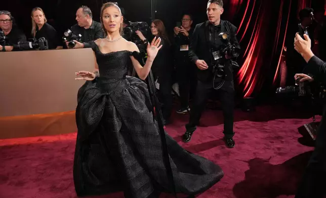 Ariana Grande arrives at the 83rd Golden Globes on Sunday, Jan. 11, 2026, at the Beverly Hilton in Beverly Hills, Calif. (Photo by Jordan Strauss/Invision/AP)