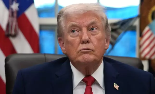 President Donald Trump listens during an event on addiction recovery in the Oval Office of the White House, Thursday, Jan. 29, 2026, in Washington. (AP Photo/Allison Robbert)