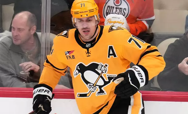 Pittsburgh Penguins' Evgeni Malkin skates during the first period of an NHL hockey game against the New Jersey Devils in Pittsburgh, Thursday, Jan. 8, 2026. (AP Photo/Gene J. Puskar)