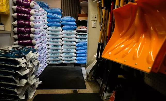 FILE - Salt and shovels are displayed for sale at Ankeny Hardware, Jan. 11, 2024, in Portland, Ore. (AP Photo/Jenny Kane, File)