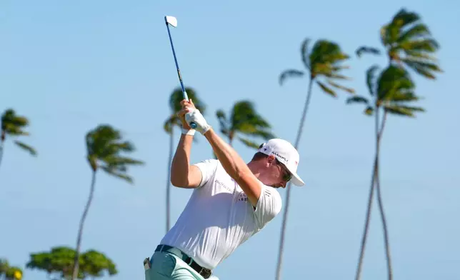 Ben Griffin hits on the 11th hole during the second round of the Sony Open golf event at the Waialae Country Club in Honolulu, Friday, Jan. 16, 2026. (AP Photo/Matt York)