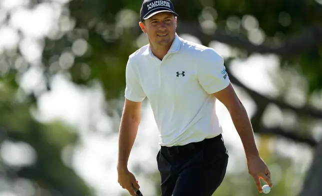 Jordan Spieth reacts on the third hole during the second round of the Sony Open golf event at the Waialae Country Club in Honolulu, Friday, Jan. 16, 2026. (AP Photo/Matt York)