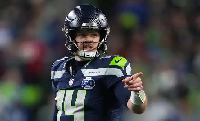 Seattle Seahawks quarterback Sam Darnold reacts during the second half of an NFL football divisional playoff game against the San Francisco 49ers, Saturday, Jan. 17, 2026, in Seattle. (AP Photo/Lindsey Wasson)