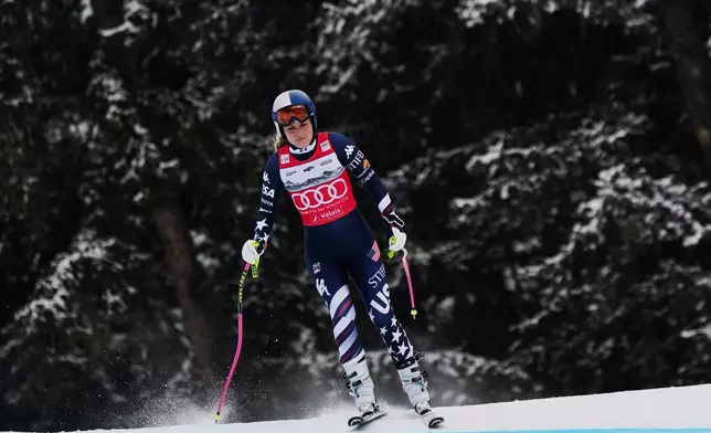 United States' Lindsey Vonn at the finish line after crashing, during an alpine ski, women's World Cup downhill, in Crans Montana , Switzerland, Friday, Jan. 30, 2026. (AP Photo/Pier Marco Tacca)