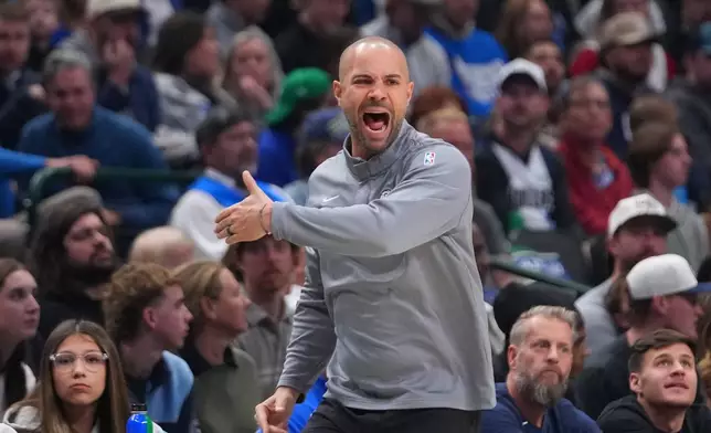 Brooklyn Nets head coach Jordi Fernandez talks to his team during the first half of an NBA basketball game against the Dallas Mavericks Monday, Jan. 12, 2026, in Dallas. (AP Photo/Julio Cortez)