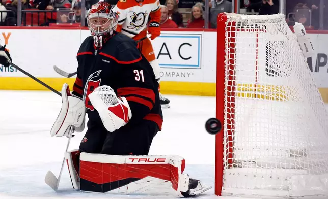 Carolina Hurricanes goaltender Frederik Andersen (31) watches the puck against the Anaheim Ducks during the first period of an NHL hockey game in Raleigh, N.C., Thursday, Jan. 8, 2026. (AP Photo/Karl DeBlaker)