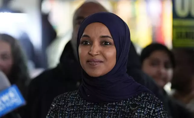 Rep. Ilhan Omar, D-Minn., stands during a press conference on Wednesday, Jan. 28, 2026, in Minneapolis. (AP Photo/Adam Gray)