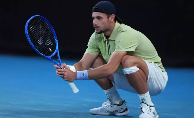Arthur Gea of France reacts during his second round match against Stan Wawrinka of Switzerland at the Australian Open tennis championship in Melbourne, Australia, Thursday, Jan. 22, 2026. (AP Photo/Asanka Brendon Ratnayake)