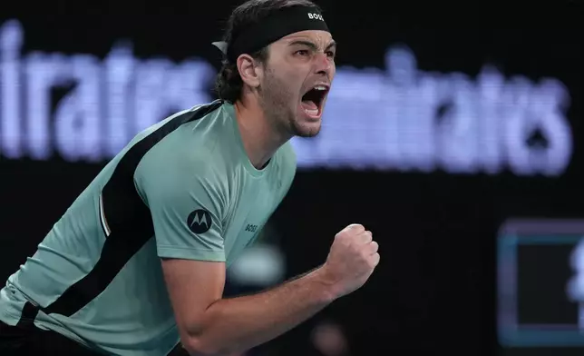Taylor Fritz of the U.S. reacts during his second round match against Vit Kopriva of the Czech Republic at the Australian Open tennis championship in Melbourne, Australia, Thursday, Jan. 22, 2026. (AP Photo/Asanka Brendon Ratnayake)