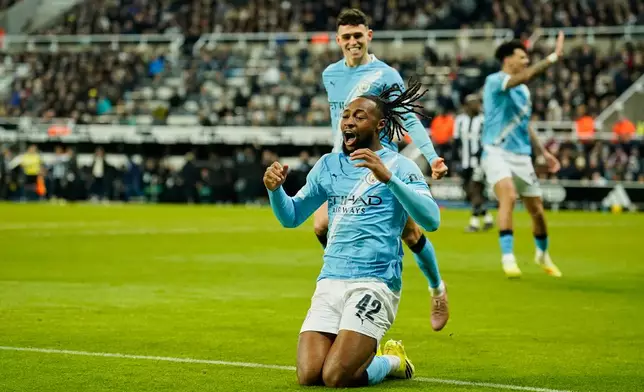 Manchester City's Antoine Semenyo celebrates after scoring his side's opening goal during the English League Cup semifinal first leg soccer match between Newcastle and Manchester City in Newcastle, England, Tuesday, Jan. 13, 2026. (AP Photo/Dave Thompson)