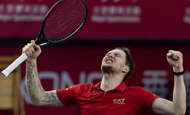 Alexander Bublik celebrates his first title of the season