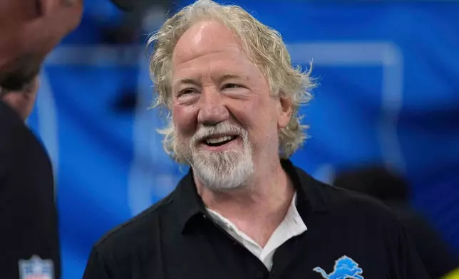 FILE - Actor Timothy Busfield smiles before an NFL football game in Detroit, Sept. 14, 2025. (AP Photo/Paul Sancya, File)