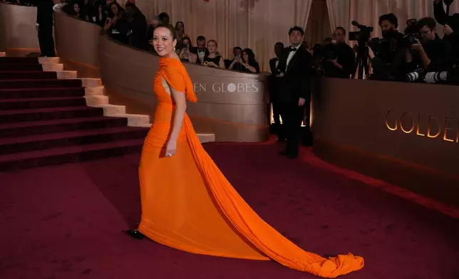 Laufey arrives at the 83rd Golden Globes on Sunday, Jan. 11, 2026, at the Beverly Hilton in Beverly Hills, Calif. (Photo by Jordan Strauss/Invision/AP)