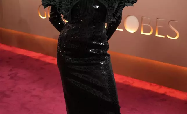 Miley Cyrus arrives at the 83rd Golden Globes on Sunday, Jan. 11, 2026, at the Beverly Hilton in Beverly Hills, Calif. (Photo by Jordan Strauss/Invision/AP)