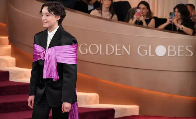 Bella Ramsey arrives at the 83rd Golden Globes on Sunday, Jan. 11, 2026, at the Beverly Hilton in Beverly Hills, Calif. (Photo by Jordan Strauss/Invision/AP)